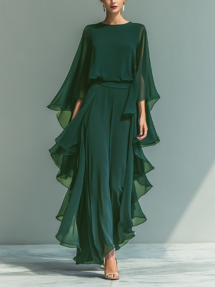 Conjunto de mujer con top de chiffon azul marino de mangas acampanadas y pantalón recto con detalles de volantes