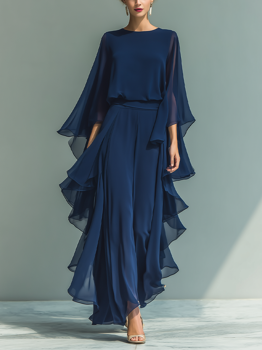 Conjunto de mujer con top de chiffon azul marino de mangas acampanadas y pantalón recto con detalles de volantes