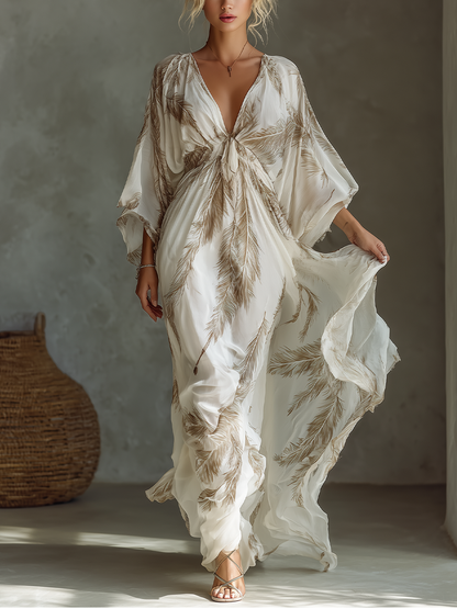 Vestido maxi de chiffon en marfil y topo con mangas dolman, parte delantera retorcida y estampado de hoja de palmera