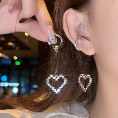 Elegantes Herz-Ohrclip – Ausgestochenes Muster voller Steine für Ohren ohne Piercing
