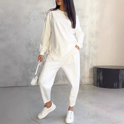 Conjunto de dos piezas para mujer: sudadera de manga larga con bajo asimétrico y pantalón.